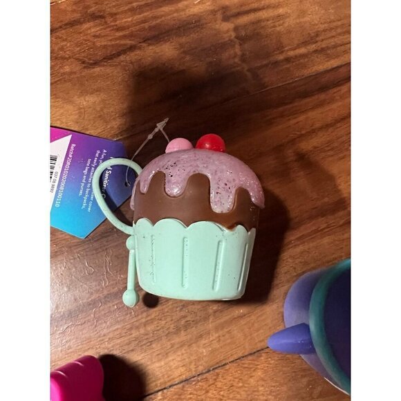 Lot of 6 hand sanitizer cases.   Good vibes, cupcake, penguin, melon - Picture 5 of 7